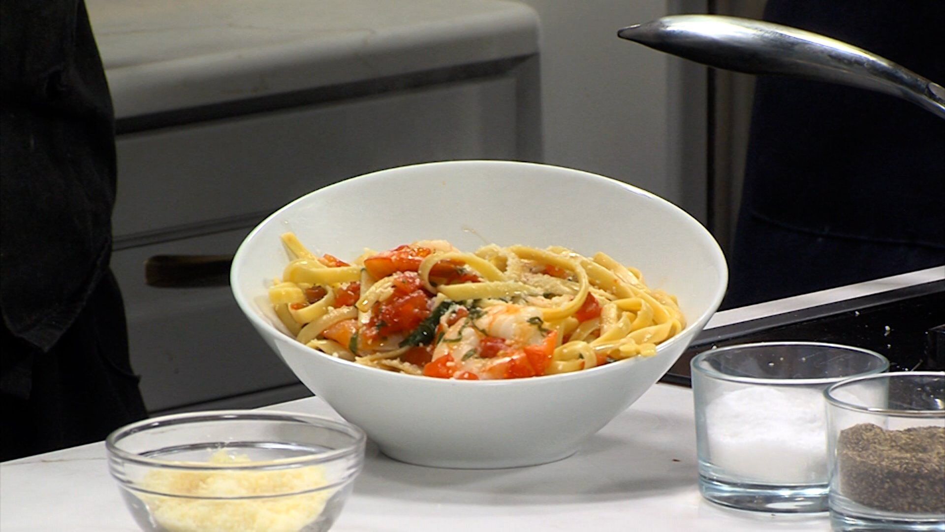 Chef Thomas O'Neil Serves Up a Delightful Shrimp Bruschetta Over Pasta Dish